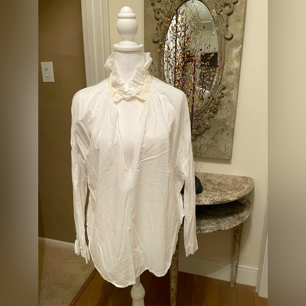 A Shirt Thing white Penelope Cabo shirt.